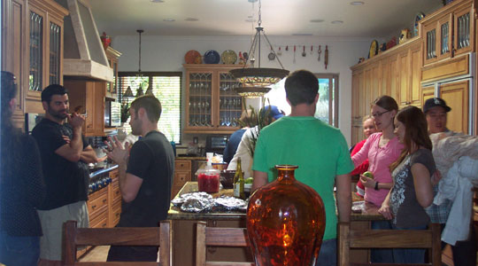 Some of the group in the kitchen